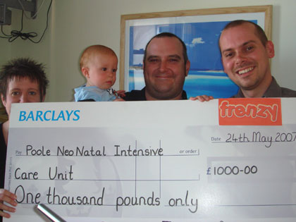 Some of the Frenzy Crew present the cheque to the Neo Natal Intensive Care Unit